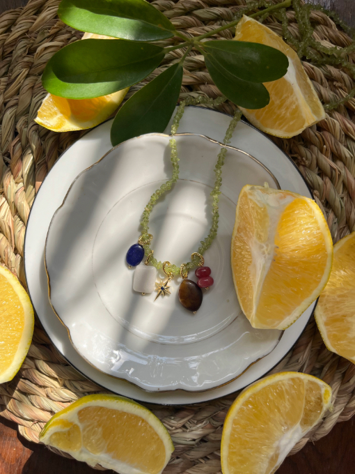 Peridot charm necklace